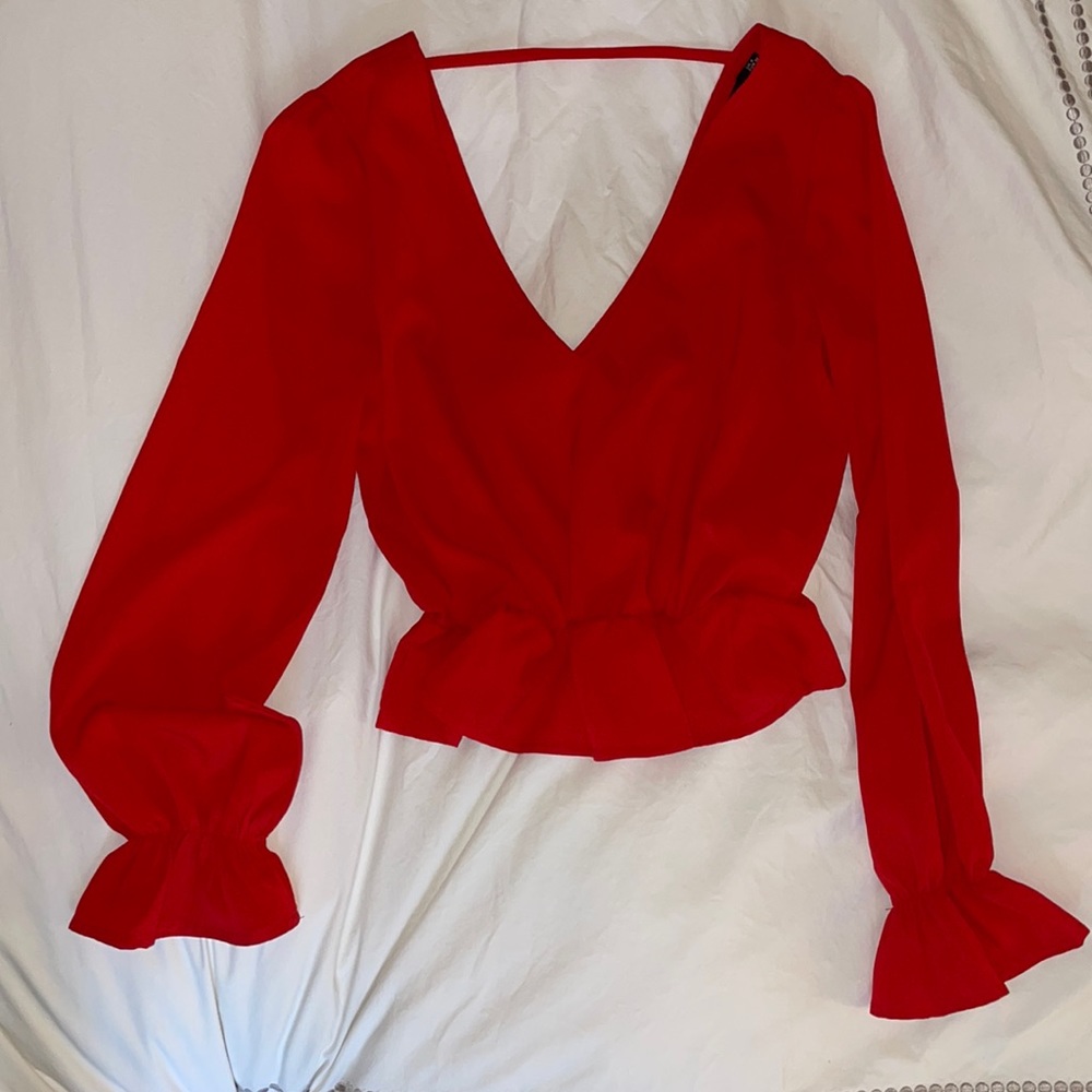 Red long sleeved blouse